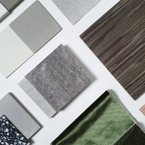 Corporate facade featuring lightweight composite tiles in matte grey.